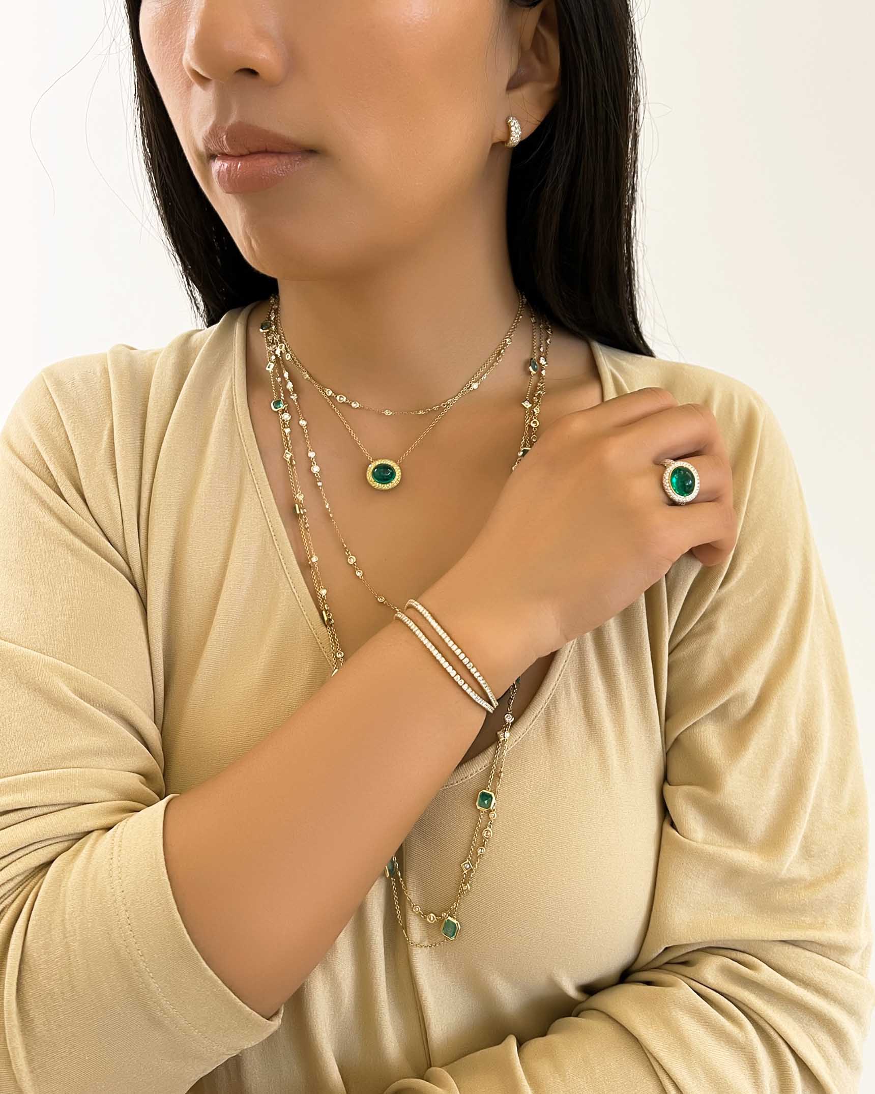 Emerald and Diamond Yellow Gold Earrings_Necklaces_Rings and Bracelets EDF5K06610 – NCOTK01651 – PNC6K01919 – NDOTK05005 – RCDEM01018 – BDUTK01508 – BDUTK01517