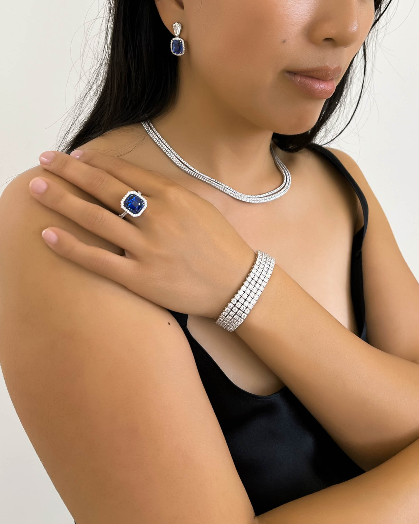 Blue Sapphire and Diamond Earrings_Ring_Necklace and Bracelet ECDKK02482 – RCDSA03007 – NDOTK03347 – BDOTK04373
