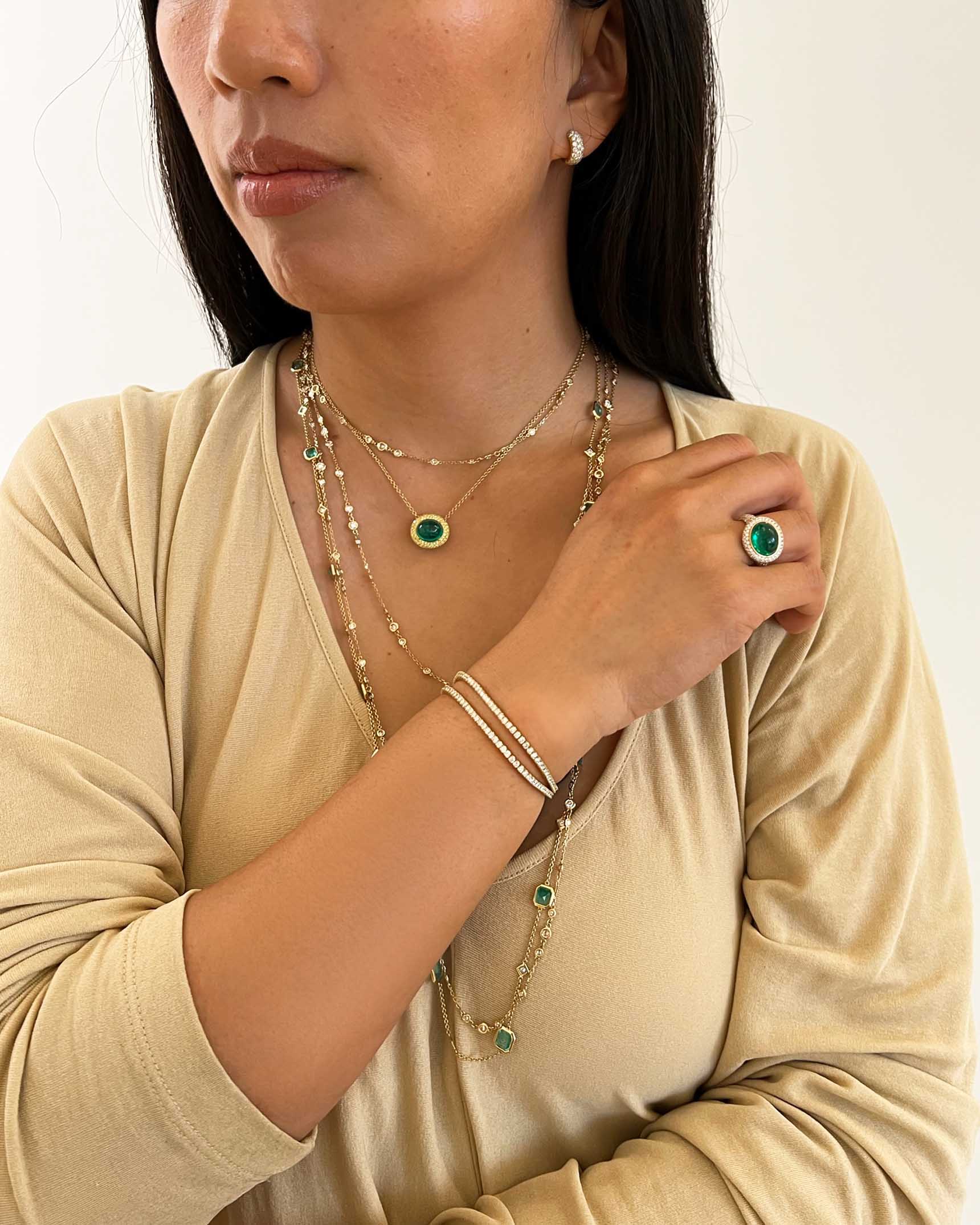 Emerald and Diamond Yellow Gold Earrings_Necklaces_Rings and Bracelets EDF5K06610 – NCOTK01651 – PNC6K01919 – NDOTK05005 – RCDEM01018 – BDUTK01508 – BDUTK01517