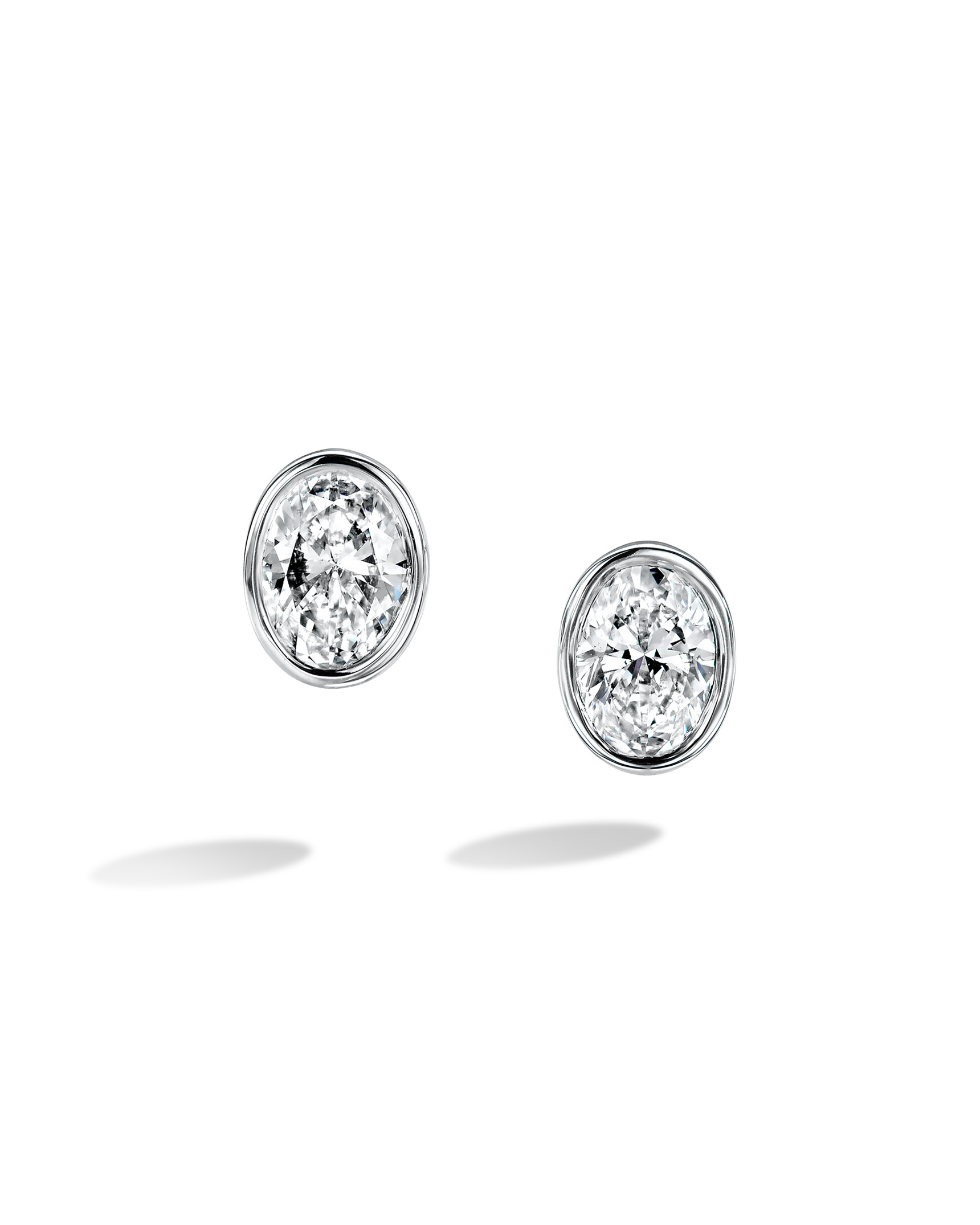 Bezel-Set Platinum and Oval Diamond Stud Earrings - Turgeon Raine